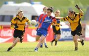 4 July 2010; Caitlin McKenna, New York, in action against Lauren Dwyer, left, and Roisin Byrne, Tinryland Bennekerry, Carlow, during the Division 4 Girls Final. Coca-Cola GAA Féile Peil na nÓg Finals 2010, Celtic Park, Derry. Photo by Sportsfile