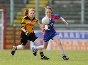 4 July 2010; Colleen Chrzanowski, New York, in action against Aisling Kelly, Tinryland Bennekerry, Carlow, during the Division 4 Girls Final. Coca-Cola GAA Féile Peil na nÓg Finals 2010, Celtic Park, Derry. Photo by Sportsfile