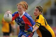 4 July 2010; Mairead Hynesi, New York, in action against Erica Farrell, Tinryland Bennekerry, Carlow, during the Division 4 Girls Final. Coca-Cola GAA Féile Peil na nÓg Finals 2010, Celtic Park, Derry. Photo by Sportsfile