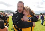 4 July 2010; Katie Rowe, Tinryland Bennekerry, Carlow, embraces manager John Dwyer after beating New York in the Division 4 Girls Final. Coca-Cola GAA Féile Peil na nÓg Finals 2010, Celtic Park, Derry. Photo by Sportsfile