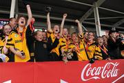 4 July 2010; Tinryland Bennekerry, Carlow, captain Lauren Dwyer celebrates with the cup alongside team-mates after they beat New York in the Division 4 Girls Final. Coca-Cola GAA Féile Peil na nÓg Finals 2010, Celtic Park, Derry. Photo by Sportsfile