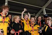 4 July 2010; Tinryland Bennekerry, Carlow, captain Lauren Dwyer celebrates with the cup alongside team-mates after they beat New York in the Division 4 Girls Final. Coca-Cola GAA Féile Peil na nÓg Finals 2010, Celtic Park, Derry. Photo by Sportsfile