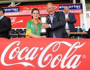 4 July 2010; Monagea, Limerick, captain Deborah Murphy accepts the cup from Pat Quill, President, Cumann Peil Gael na mBan, after they beat St. Laurence O'Tooles, Dublin, in the Division 2 Girls Final. Coca-Cola GAA Féile Peil na nÓg Finals 2010, Celtic Park, Derry. Photo by Sportsfile