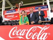 4 July 2010; Monagea, Limerick, captain Deborah Murphy lifts the cup alongside Pat Quill, President, Cumann Peil Gael na mBan, after they beat St. Laurence O'Tooles, Dublin, in the Division 2 Girls Final. Coca-Cola GAA Féile Peil na nÓg Finals 2010, Celtic Park, Derry. Photo by Sportsfile