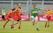 4 July 2010; Ciara Burke, Claregalway, Galway, in action against, Emma Wheeler, St. Laurences, Kildare, in the Division 1 Girls Final. Coca-Cola GAA Féile Peil na nÓg Finals 2010, Celtic Park, Derry. Photo by Sportsfile