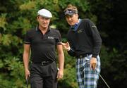 5 July 2010; Ian Poulter gives some advice to Michael Flatley, left, on the 13th green during the JP McManus Invitational Pro-Am. Adare Manor, Co. Limerick. Picture credit: Diarmuid Greene / SPORTSFILE