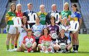 5 July 2010; 2010 marks the 10 year milestone of TG4’s sponsorship of the Ladies Football All Ireland Championships and the tenth year of the Ladies Football finals being televised by the national Irish language broadcaster. TG4 who became the title sponsors of the Ladies Football Championships in 2000 will broadcast 15 live championship games over the course of the summer. At the launch of the 2010 TG4 Ladies Football Championships at Croke Park are Pól Ó'Gallchóir, Ceannasai, TG4, left, and Pat Quill, Uactharán Peil Gael na mBan, with senior players, back row, from left, Mags O'Donoghue, Kerry, Michaela Downey, Down, Edel McManus, Leitrim, Philomena Sheridan, Meath, and Mairead Morrissey, Tipperary, middle row, from left, Aisling Holton, Kildare, Denise Masterson, Dublin, Emer Flaherty, Galway, and Yvonne Connell, Monaghan, with front row, from left, Sinead McLaughlin, Tyrone, Geraldine O'Flynn, Cork, and Jackie Mulligan, Sligo. Croke Park, Dublin. Picture credit: Brendan Moran / SPORTSFILE