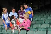 5 July 2010; 2010 marks the 10 year milestone of TG4’s sponsorship of the Ladies Football All Ireland Championships and the tenth year of the Ladies Football finals being televised by the national Irish language broadcaster. TG4 who became the title sponsors of the Ladies Football Championships in 2000 will broadcast 15 live championship games over the course of the summer. At the launch of the 2010 TG4 Ladies Football Championships at Croke Park is Minister for Tourism, Culture and Sport, Mary Hanafin, TD, with senior players, clockwise from left, Yvonne Connell, Monaghan, Denise Masterson, Dublin, Emer Flaherty, Galway, Mairead Morrissey, Tipperary, and Geraldine O'Flynn, Cork. Croke Park, Dublin. Picture credit: Brendan Moran / SPORTSFILE