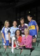 5 July 2010; 2010 marks the 10 year milestone of TG4’s sponsorship of the Ladies Football All Ireland Championships and the tenth year of the Ladies Football finals being televised by the national Irish language broadcaster. TG4 who became the title sponsors of the Ladies Football Championships in 2000 will broadcast 15 live championship games over the course of the summer. At the launch of the 2010 TG4 Ladies Football Championships at Croke Park is Minister for Tourism, Culture and Sport, Mary Hanafin, TD, with senior players, clockwise from left, Yvonne Connell, Monaghan, Denise Masterson, Dublin, Emer Flaherty, Galway, Mairead Morrissey, Tipperary, and Geraldine O'Flynn, Cork. Croke Park, Dublin. Picture credit: Brendan Moran / SPORTSFILE