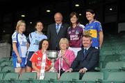 5 July 2010; 2010 marks the 10 year milestone of TG4’s sponsorship of the Ladies Football All Ireland Championships and the tenth year of the Ladies Football finals being televised by the national Irish language broadcaster. TG4 who became the title sponsors of the Ladies Football Championships in 2000 will broadcast 15 live championship games over the course of the summer. At the launch of the 2010 TG4 Ladies Football Championships at Croke Park is Minister for Tourism, Culture and Sport, Mary Hanafin, TD, with senior players, clockwise from left, Yvonne Connell, Monaghan, Denise Masterson, Dublin, Pat Quill, Uactharán Peil Gael na mBan, Emer Flaherty, Galway, Mairead Morrissey, Tipperary, Pól Ó'Gallchóir, Ceannasai, TG4, and Geraldine O'Flynn, Cork. Croke Park, Dublin. Picture credit: Brendan Moran / SPORTSFILE