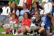 5 July 2010; 2010 marks the 10 year milestone of TG4’s sponsorship of the Ladies Football All Ireland Championships and the tenth year of the Ladies Football finals being televised by the national Irish language broadcaster. TG4 who became the title sponsors of the Ladies Football Championships in 2000 will broadcast 15 live championship games over the course of the summer. At the launch of the 2010 TG4 Ladies Football Championships at Croke Park are senior players, middle row, from left, Aisling Holton, Kildare, Denise Masterson, Dublin, Emer Flaherty, Galway, and Yvonne Connell, Monaghan, with front row, from left, Sinead McLaughlin, Tyrone, Geraldine O'Flynn, Cork, and Jackie Mulligan, Sligo. Croke Park, Dublin. Picture credit: Stephen McCarthy / SPORTSFILE