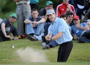 5 July 2010; Former Irish rugby international Brendan Mullin plays from the bunker onto the 6th green during the JP McManus Invitational Pro-Am. Adare Manor, Adare, Co. Limerick. Picture credit: Matt Browne / SPORTSFILE