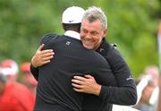 5 July 2010; Darren Clarke embraces Tiger Woods ahead of their afternoon round at the JP McManus Invitational Pro-Am. Adare Manor, Adare, Co. Limerick. Picture credit: Diarmuid Greene / SPORTSFILE