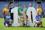 5 July 2010; 2010 marks the 10 year milestone of TG4’s sponsorship of the Ladies Football All Ireland Championships and the tenth year of the Ladies Football finals being televised by the national Irish language broadcaster. TG4 who became the title sponsors of the Ladies Football Championships in 2000 will broadcast 15 live championship games over the course of the summer. At the launch of the 2010 TG4 Ladies Football Championships at Croke Park is Pól Ó'Gallchóir, Ceannasai, TG4, left, and Pat Quill, Uachtarán, Cumann Peil Gael na mBan, with Intermediate players, back row, from left, Emer Casey, Roscommon, Aoife McDonald, Fermanagh, Aine McBrien, Fermanagh, and Caroline Kelly, Antrim, with, front row, from left, Michelle Ross, Longford, Layrena Murphy, Kilkenny, and Mary Foley, Waterford. Croke Park, Dublin. Picture credit: Brendan Moran / SPORTSFILE