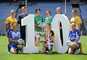 5 July 2010; 2010 marks the 10 year milestone of TG4’s sponsorship of the Ladies Football All Ireland Championships and the tenth year of the Ladies Football finals being televised by the national Irish language broadcaster. TG4 who became the title sponsors of the Ladies Football Championships in 2000 will broadcast 15 live championship games over the course of the summer. At the launch of the 2010 TG4 Ladies Football Championships at Croke Park is Pól Ó'Gallchóir, Ceannasai, TG4, left, and Pat Quill, Uachtarán, Cumann Peil Gael na mBan, with Intermediate players, back row, from left, Emer Casey, Roscommon, Aoife McDonald, Fermanagh, Aine McBrien, Fermanagh, and Caroline Kelly, Antrim, with, front row, from left, Michelle Ross, Longford, Layrena Murphy, Kilkenny, and Mary Foley, Waterford. Croke Park, Dublin. Picture credit: Brendan Moran / SPORTSFILE