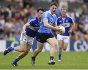 4 June 2016; John Small of Dublin in action against Paul Cotter of Laois during the Leinster GAA Football Senior Championship Quarter-Final match between Laois and Dublin in Nowlan Park, Kilkenny. Photo by Stephen McCarthy/Sportsfile