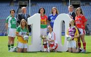 5 July 2010; 2010 marks the 10 year milestone of TG4’s sponsorship of the Ladies Football All Ireland Championships and the tenth year of the Ladies Football finals being televised by the national Irish language broadcaster. TG4 who became the title sponsors of the Ladies Football Championships in 2000 will broadcast 15 live championship games over the course of the summer. At the launch of the 2010 TG4 Ladies Football Championships at Croke Park is Pól Ó'Gallchóir, Ceannasai, TG4, right, and Pat Quill, Uachtarán, Cumann Peil Gael na mBan, with Junior players, back row, from left, Paula Donnelly, Limerick, Marian Hayden, Carlow, Caitriona McKeon, Wicklow, and Grace Lynch, Louth, with, front row, from left, Niamh Malone, Offaly, Gemma Watson, Derry, and Marguerite Doyle, Wexford. Croke Park, Dublin. Picture credit: Brendan Moran / SPORTSFILE