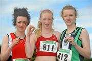 4 July 2010; Winner of the U16 Girl's Long Jump Sarah McCarthy, Fingallians, centre, with second place Roisin Laverty, City of Derry, left, and third place Heather Carson, Ballymena & Antrim, during the Woodie's DIY AAI Juvenile Track & Field Championships. Tullamore Harriers Stadium, Tullamore, Co. Offaly. Picture credit: Brian Lawless / SPORTSFILE