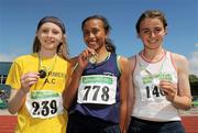 4 July 2010; Winner of the U13 Girl's 600m Nadia Power, Templeogue, centre, with second place, Dearbhaile Beirne, Mohill, right, and third place Rose Finnegan, Bohermeen, during the Woodie's DIY AAI Juvenile Track & Field Championships. Tullamore Harriers Stadium, Tullamore, Co. Offaly. Picture credit: Brian Lawless / SPORTSFILE