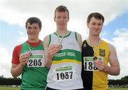 4 July 2010; Winner of the U19 Boy's Shot Putt Diarmuid Hickey, Riverstick/Kinsale, centre, with second place, Conal Campion, St. Andrews, left, and Peter Walsh, Kilkenny City Harriers, during the Woodie's DIY AAI Juvenile Track & Field Championships. Tullamore Harriers Stadium, Tullamore, Co. Offaly. Picture credit: Brian Lawless / SPORTSFILE
