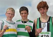4 July 2010; Winner of the U16 Boy's Pole Vault Lee Curley, Youghal, centre, with second place James Delaney, St. Abbans, left, and third place Stewart Gault, Ballymena & Antrim, during the Woodie's DIY AAI Juvenile Track & Field Championships. Tullamore Harriers Stadium, Tullamore, Co. Offaly. Picture credit: Brian Lawless / SPORTSFILE