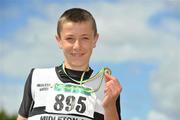 4 July 2010; Winner of the U14 Boy's Javelin Seadnaidh Smyth, Midleton, with his Gold medal, during the Woodie's DIY AAI Juvenile Track & Field Championships. Tullamore Harriers Stadium, Tullamore, Co. Offaly. Picture credit: Brian Lawless / SPORTSFILE