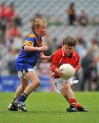 6 July 2010; Adam Carney, Coralstown, Co. Westmeath, in action against, David Corcoran, Annanough, Co. Laois, during the ‘Play & Stay with the GAA’ Activity Days. Croke Park, Dublin. Picture credit: Barry Cregg / SPORTSFILE