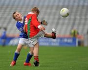 6 July 2010; Nicky Murphy, right, Palatine, Co. Carlow, gets his kick away despite the challenge from Patrick Kellett, Celbridge, Co. Kildare, during the ‘Play & Stay with the GAA’ Activity Days. Croke Park, Dublin. Picture credit: Barry Cregg / SPORTSFILE