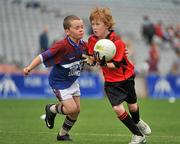 6 July 2010; Jacob Beatty, Na Fianna, Co. Offaly, in action against Óisin Ryan, Tang/Maryland, Co.Westmeath, during the ‘Play & Stay with the GAA’ Activity Days. Croke Park, Dublin. Picture credit: Barry Cregg / SPORTSFILE