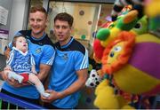 9 June 2016; Dublin Footballer Ciarán Kilkenny and Hurler Cian Boland met Henry Donnelly, from Co. Offaly, in Temple Street Children’s University Hospital today as they delivered 100 Dublin jerseys on behalf of Dublin sponsors AIG Insurance to some of their biggest fans. Temple Street Children's University Hospital, Dublin. Photo by Stephen McCarthy/Sportsfile