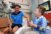 9 June 2016; Dublin Hurler Cian Boland met Kyron Walsh, aged 5, from Finglas West, Co. Dublin, in Temple Street Children’s University Hospital today as they delivered 100 Dublin jerseys on behalf of Dublin sponsors AIG Insurance to some of their biggest fans. Temple Street Children's University Hospital, Dublin. Photo by Stephen McCarthy/Sportsfile