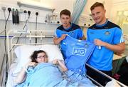 9 June 2016; Dublin Hurler Cian Boland and Footballer Ciarán Kilkenny met Sophie Deegan, from Coolock, Co. Dublin, in Temple Street Children’s University Hospital today as they delivered 100 Dublin jerseys on behalf of Dublin sponsors AIG Insurance to some of their biggest fans. Temple Street Children's University Hospital, Dublin. Photo by Stephen McCarthy/Sportsfile