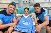 9 June 2016; Dublin Hurler Cian Boland and Footballer Ciarán Kilkenny met Niall Davis, from Co. Meath, in Temple Street Children’s University Hospital today as they delivered 100 Dublin jerseys on behalf of Dublin sponsors AIG Insurance to some of their biggest fans. Temple Street Children's University Hospital, Dublin. Photo by Stephen McCarthy/Sportsfile