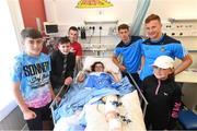 9 June 2016; Dublin Hurler Cian Boland and Footballer Ciarán Kilkenny met Sophie Deegan, from Coolock, Co. Dublin, and family, from left, Eoin, Jordan, Lee and Chloe in Temple Street Children’s University Hospital today as they delivered 100 Dublin jerseys on behalf of Dublin sponsors AIG Insurance to some of their biggest fans. Temple Street Children's University Hospital, Dublin. Photo by Stephen McCarthy/Sportsfile