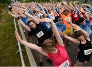 9 June 2016; A general view of the group warm up ahead of the Grant Thornton Corporate 5K Team Challenge at the National Sports Campus in Abbotstown, Dublin. Photo by Sam Barnes/Sportsfile