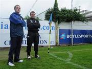 9 July 2010; Drogheda United manager Darius Kierans, left, and Bohemians manager Pat Fenlon wait patiently on the sideline before the game was called off due to lights failure. Airtricity League Premier Division, Drogheda United v Bohemians, United Park, Drogheda, Co. Louth. Photo by Sportsfile