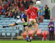 10 July 2010; Peader O'Neill, Cork, in action against Martin Cahill, Cavan. GAA Football All-Ireland Senior Championship Qualifier, Round 2, Cork v Cavan, Pairc Ui Chaoimh, Cork.  Picture credit: Matt Browne / SPORTSFILE