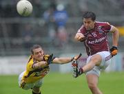 10 July 2010; Mathew Clancy, Galway, in action against Adrian Flynn, Wexford. GAA Football All-Ireland Senior Championship Qualifier, Round 2, Galway v Wexford, Pearse Stadium, Galway. Picture credit: Ray Ryan / SPORTSFILE