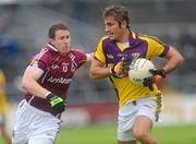 10 July 2010; Brian Malone, Wexford, in action against Gary Sice, Galway. GAA Football All-Ireland Senior Championship Qualifier, Round 2, Galway v Wexford, Pearse Stadium, Galway. Picture credit: Ray Ryan / SPORTSFILE