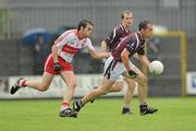 10 July 2010; Dessie Dolan, Westmeath, in action against Cathal McKeever, Derry. GAA Football All-Ireland Senior Championship Qualifier, Round 2, Westmeath v Derry, Cusack Park, Mullingar, Co. Westmeath. Photo by Sportsfile
