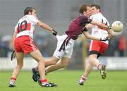 10 July 2010; Doran Harte, Westmeath, in action against Cathal McKeever, Derry. GAA Football All-Ireland Senior Championship Qualifier, Round 2, Westmeath v Derry, Cusack Park, Mullingar, Co. Westmeath. Photo by Sportsfile