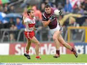 10 July 2010; David Duffy, Westmeath, in action against Cathal McKeever, Derry. GAA Football All-Ireland Senior Championship Qualifier, Round 2, Westmeath v Derry, Cusack Park, Mullingar, Co. Westmeath. Photo by Sportsfile