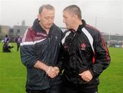 10 July 2010; Westmeath manager Pat Flanagan with Derry manager Damian Cassidy, right, after the game. GAA Football All-Ireland Senior Championship Qualifier, Round 2, Westmeath v Derry, Cusack Park, Mullingar, Co. Westmeath. Photo by Sportsfile