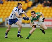 10 July 2010; Ross Brady, Offaly, in action against Brian Wall, Waterford. GAA Football All-Ireland Senior Championship Qualifier, Round 2, Offaly v Waterford, O'Connor Park, Tullamore, Co. Offaly. Picture credit: David Maher / SPORTSFILE