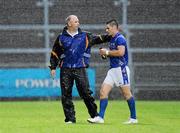 10 July 2010; Longford manager Glen Ryan commiserates with Shane Mulligan after receiving a second yellow card. GAA Football All-Ireland Senior Championship Qualifier, Round 2, Down v Longford, Pairc Esler, Newry, Co. Down. Picture credit: Oliver McVeigh / SPORTSFILE