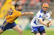 11 July 2010; Eamonn Murphy, Waterford, in action against Tony Kelly, Clare. ESB Munster GAA Hurling Minor Championship Final, Waterford v Clare, Semple Stadium, Thurles, Co. Tipperary. Picture credit: Stephen McCarthy / SPORTSFILE