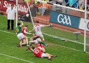 11 July 2010; Joe Sheridan, on the ground, Meath, beats Louth players, left to right, Paddy Keenan, Andy McDonnell, Dessie Finnegan and goalkeeper Neil Gallagher, on his way to scoring a late goal to win the Leinster title. Leinster GAA Football Senior Championship Final, Meath v Louth, Croke Park, Dublin. Picture credit: David Maher / SPORTSFILE