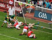 11 July 2010; Joe Sheridan, on the ground, right, Meath, beats Louth players, left to right, Paddy Keenan, Andy McDonnell, Dessie Finnegan and goalkeeper Neil Gallagher, on his way to scoring a late goal to win the Leinster title. Leinster GAA Football Senior Championship Final, Meath v Louth, Croke Park, Dublin. Picture credit: David Maher / SPORTSFILE