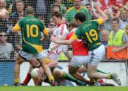 11 July 2010; Joe Sheridan, Meath, is tackled on the ground by Louth goalkeeper Neil Gallagher and Paddy Keenan, 8, before scoring the winning goal against Louth. Leinster GAA Football Senior Championship Final, Meath v Louth, Croke Park, Dublin. Picture credit: Matt Browne / SPORTSFILE