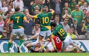 11 July 2010; Joe Sheridan, Meath, is tackled on the ground by Louth goalkeeper Neil Gallagher and Paddy Keenan, 8, before scoring the winning goal against Louth. Leinster GAA Football Senior Championship Final, Meath v Louth, Croke Park, Dublin. Picture credit: Matt Browne / SPORTSFILE